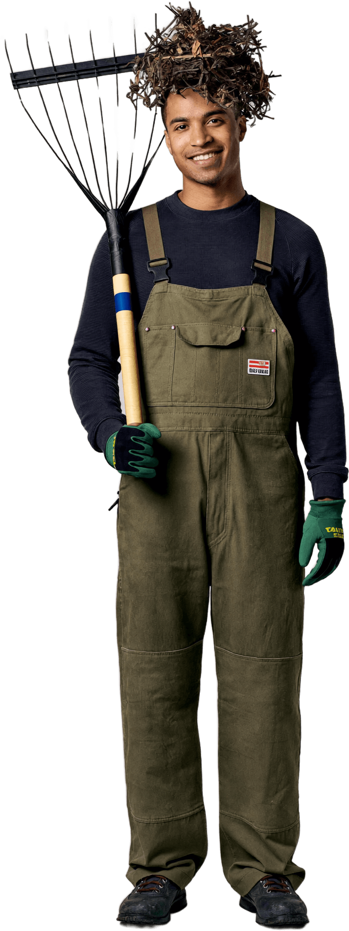 A TMP Landscaping crew member carrying out Spring Cleanup
