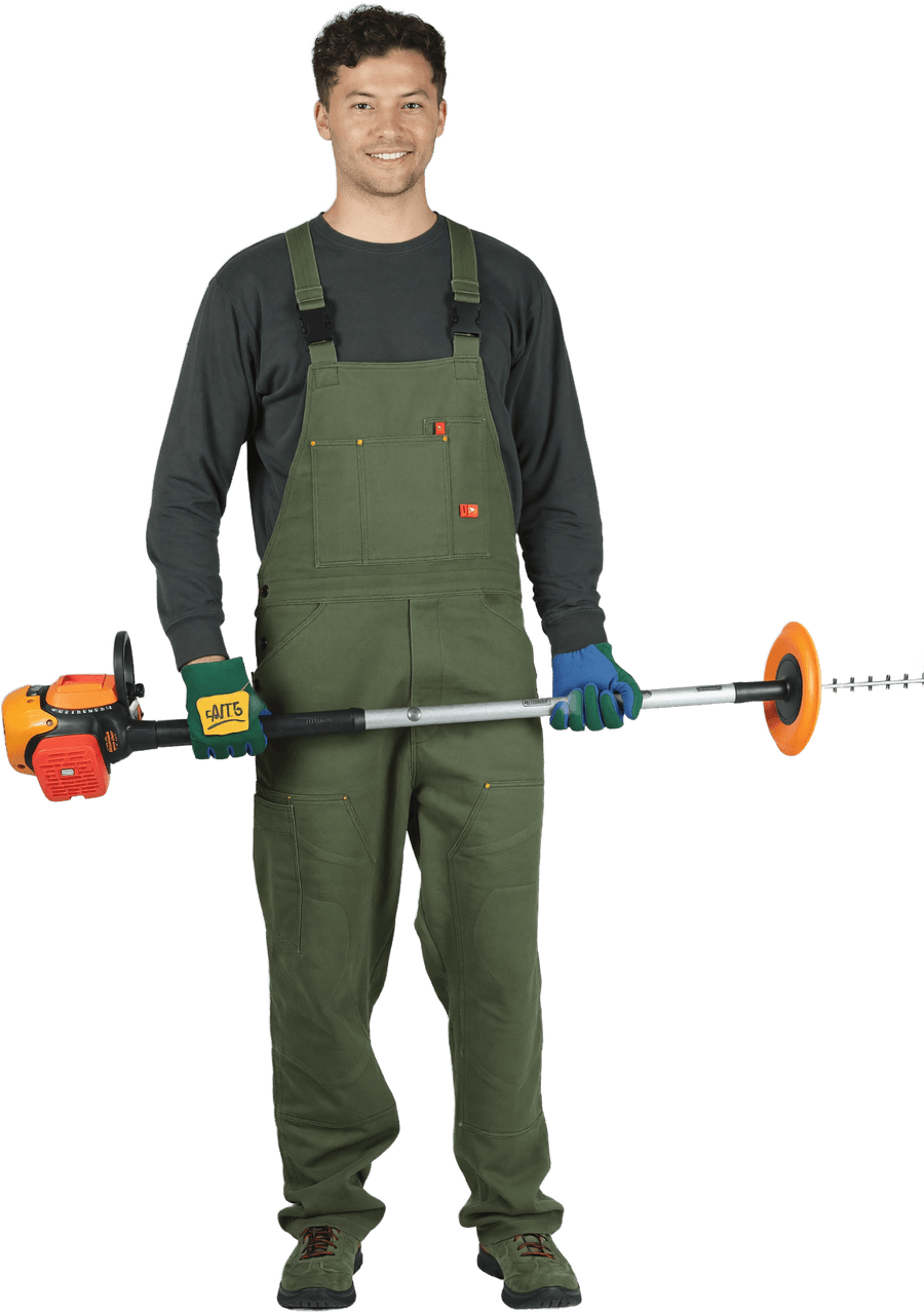 A TMP Landscaping crew member carrying out Weed Whacking